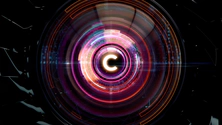A glowing, futuristic circular design with a letter "C" in the center, featuring vibrant neon colors and concentric patterns.