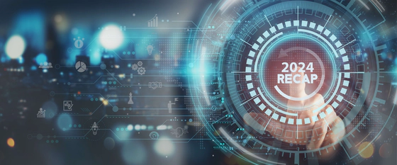 Graphic of a 2024 Recap button with a hand seen behind this with index finger pointing towards the text. White font. The heading is surrounded by a circular arrow, blue circles, lines, icons and geometric shapes.