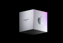 A silver 3D cube with "Apple Design Awards 2023" and an Apple logo, floating against a black background.
