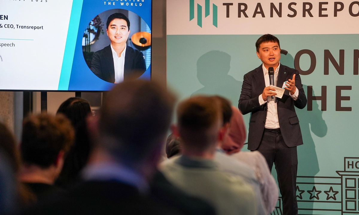 Transreport employees smiling at the camera