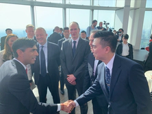 Jay Shen, CEO of Transreport, shaking hands with Rishi Sunak, Prime Minister of the United Kingdom, at the G7 2023 summit.